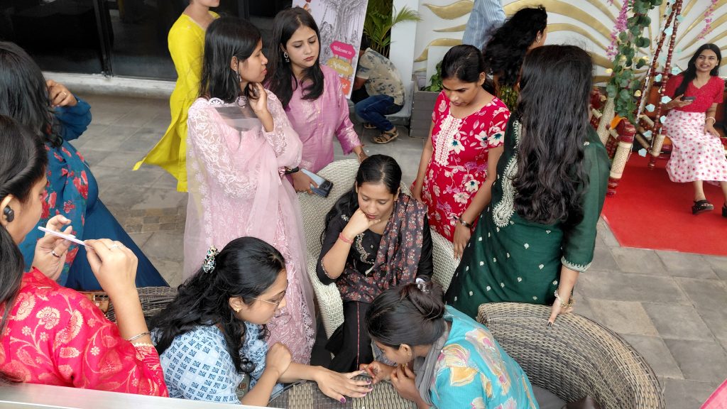 Employees participating in Raja Parba celebrations