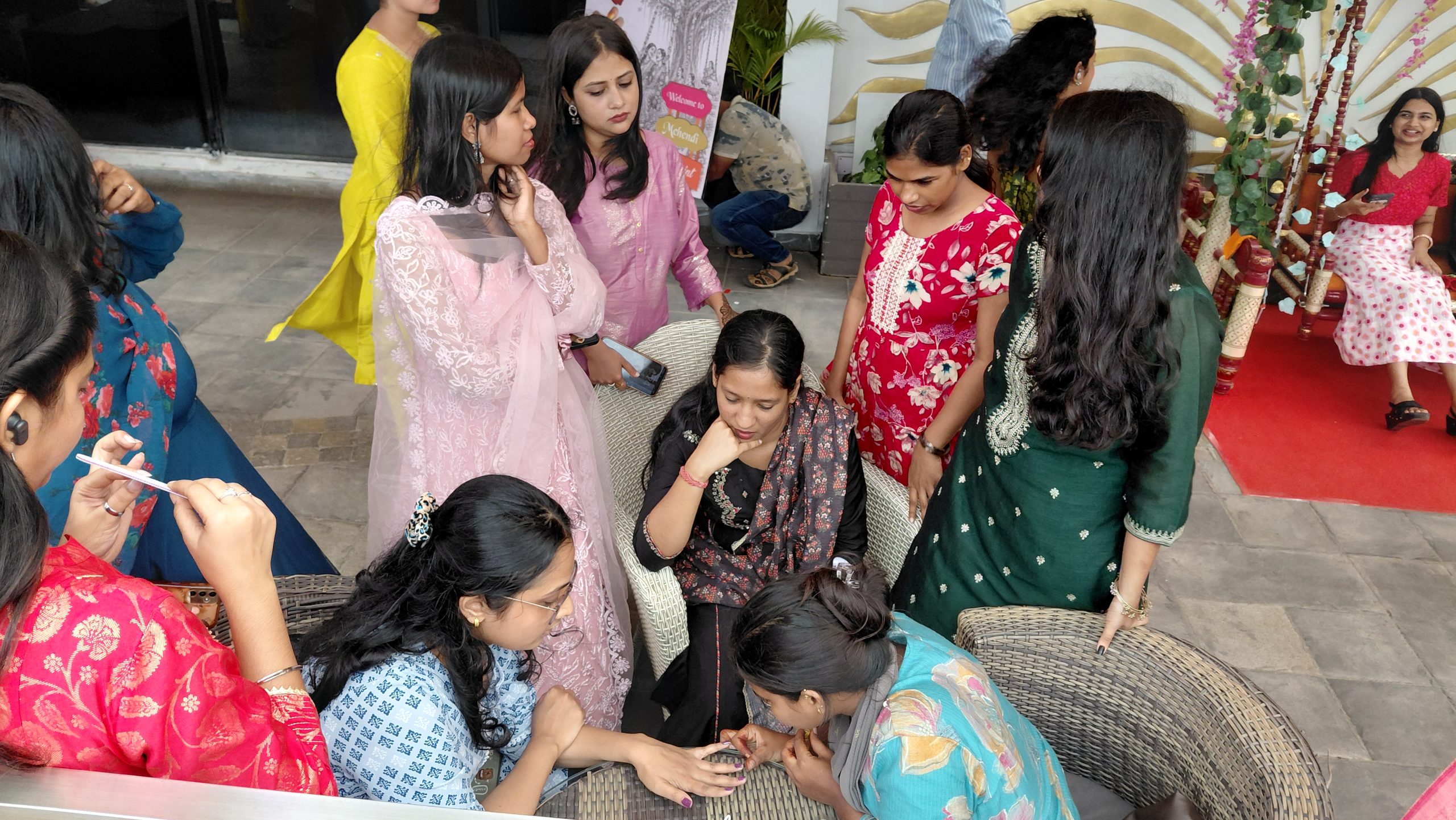 Employees participating in Raja Parba celebrations