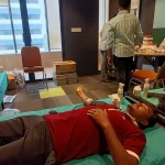 Employees donating blood