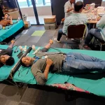 Employees participating in iServeU CSR blood donation 2
